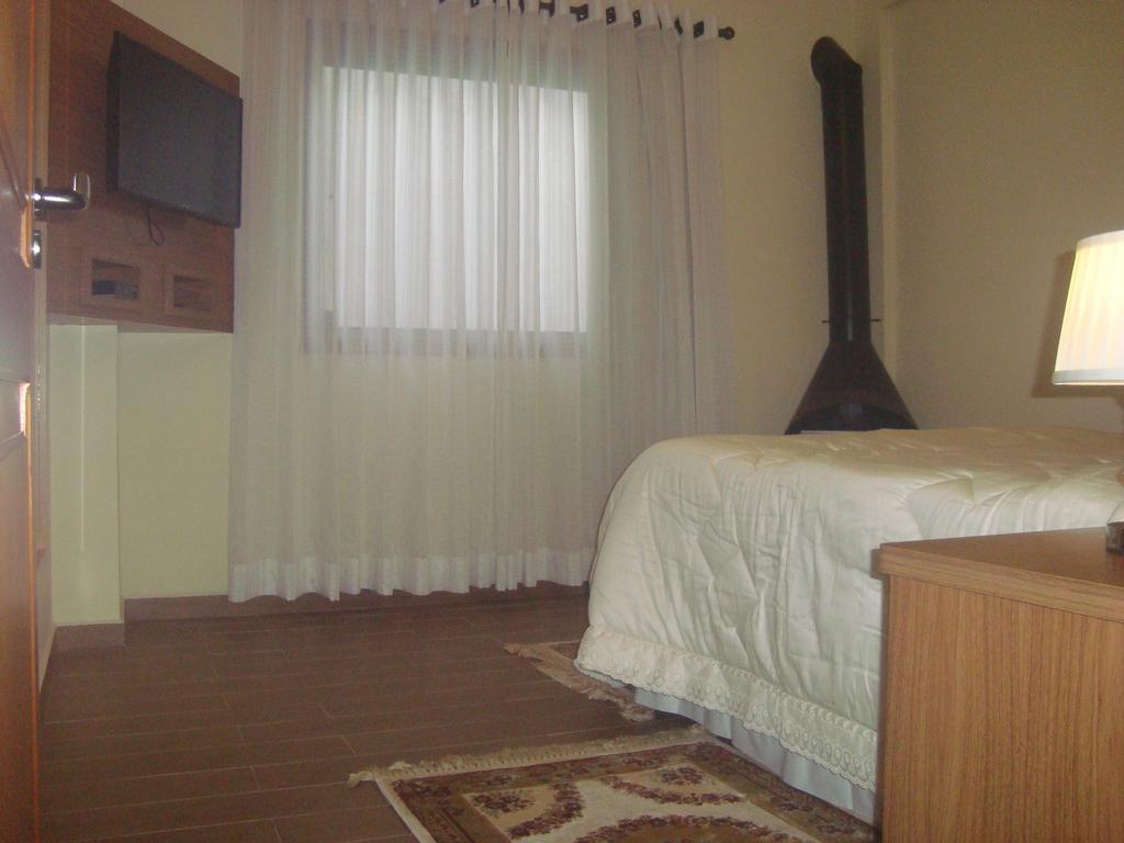 Caluan Apartment Monte Verde Szoba fotó